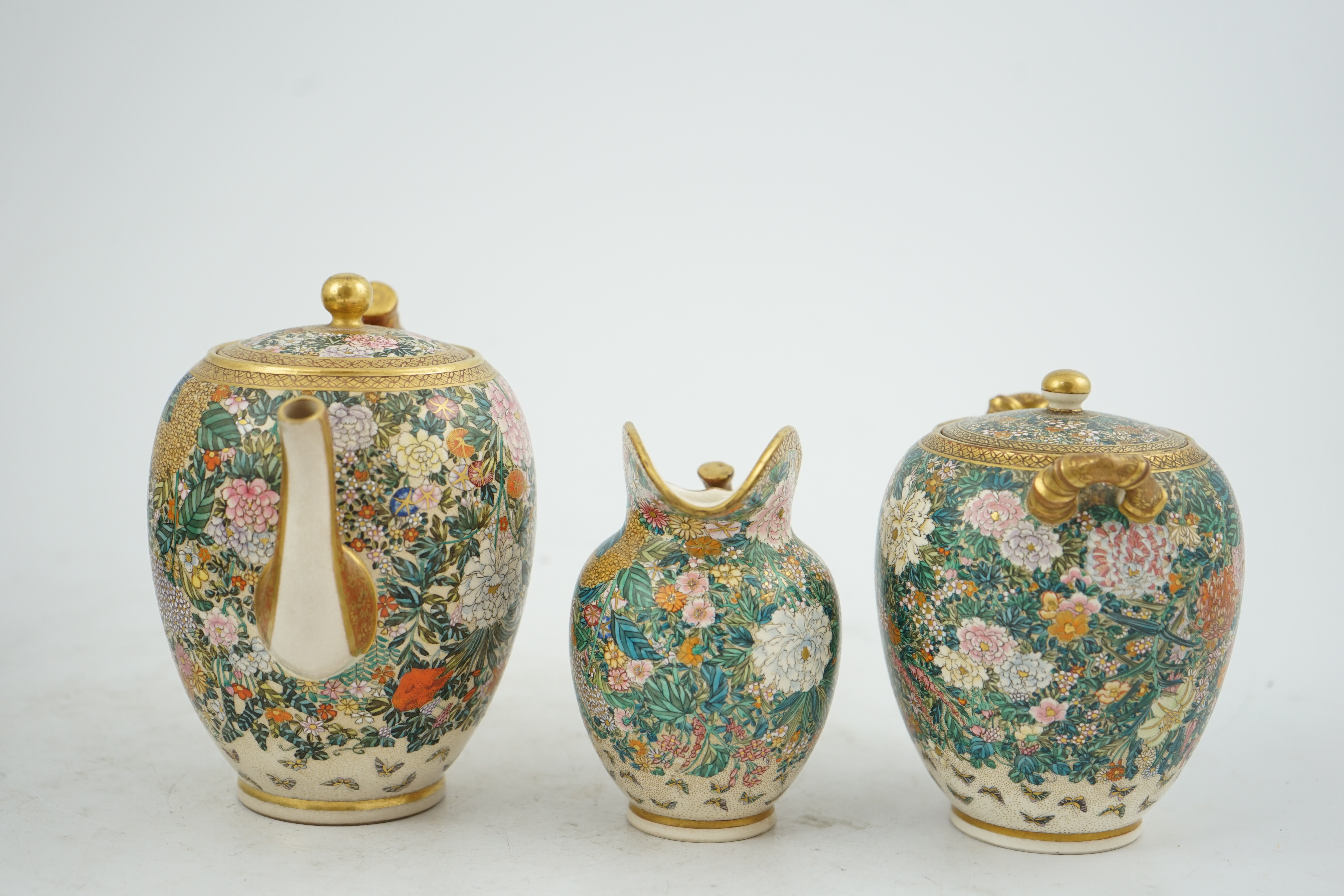 A fine Japanese Satsuma ‘millefleur’ three piece teaset, by Kinkozan, Meiji period